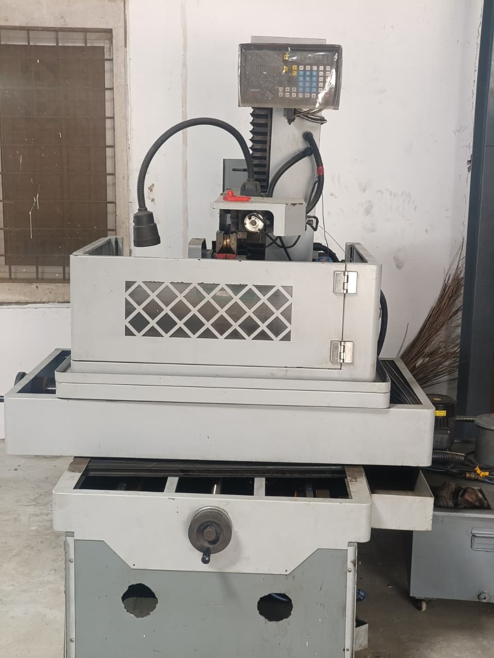 EDM wire cut machine with digital readout