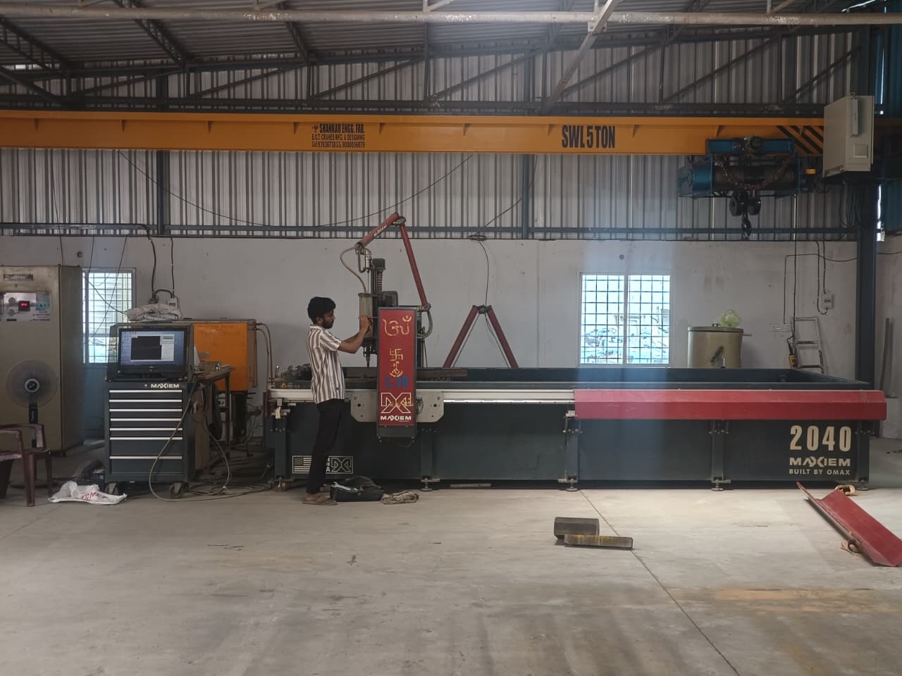 MAXIEM 2040 water jet cutting machine in operation